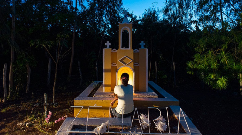 SOCIAL COST: Jose Maria Filho, a Ceara farmer, was shot to death after waging a campaign against the overuse of pesticides. His widow, Maria Lucinda Xavier, recently visited a monument to him the family built at his murder site. REUTERS/Davi Pinheiro